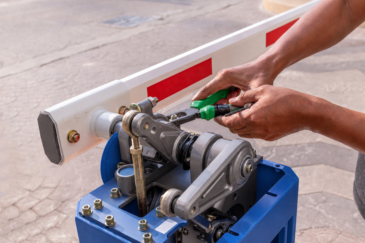 close-up-technician-assemble-blue-barrier-gate-automati-2026-03-09-02-52-24-utc